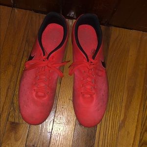 Fiery red soccer cleats